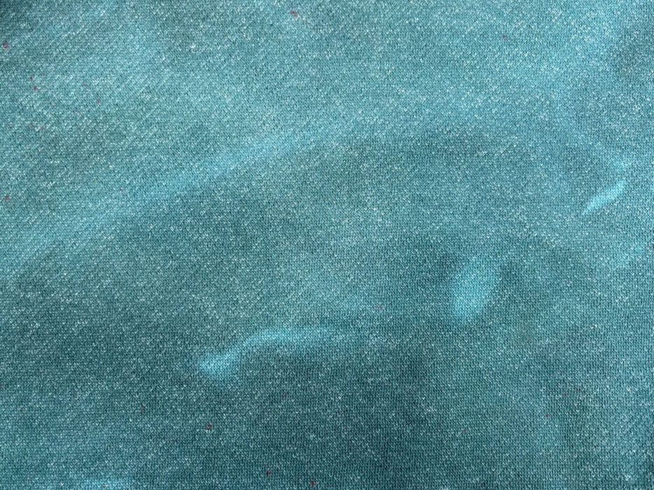 Dyed example: Textured teal fabric up-close