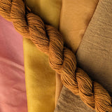 Himalayan Rhubarb Extract - Rheum emodi Dyed examples were done at 50% OWG. We used our Silk Hankies (#SH), our Cotton Bubble Gauze (#CG2-50"), and our Single Sock HT Mini Skeins (#YARN104)