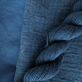 Indigo Extract - Indigofera tinctoria Dyed examples were done at 50% OWG. We used our Silk Hankies (#SH), our Cotton Bubble Gauze (#CG2-50"), and our Single Sock HT Mini Skeins (#YARN104)