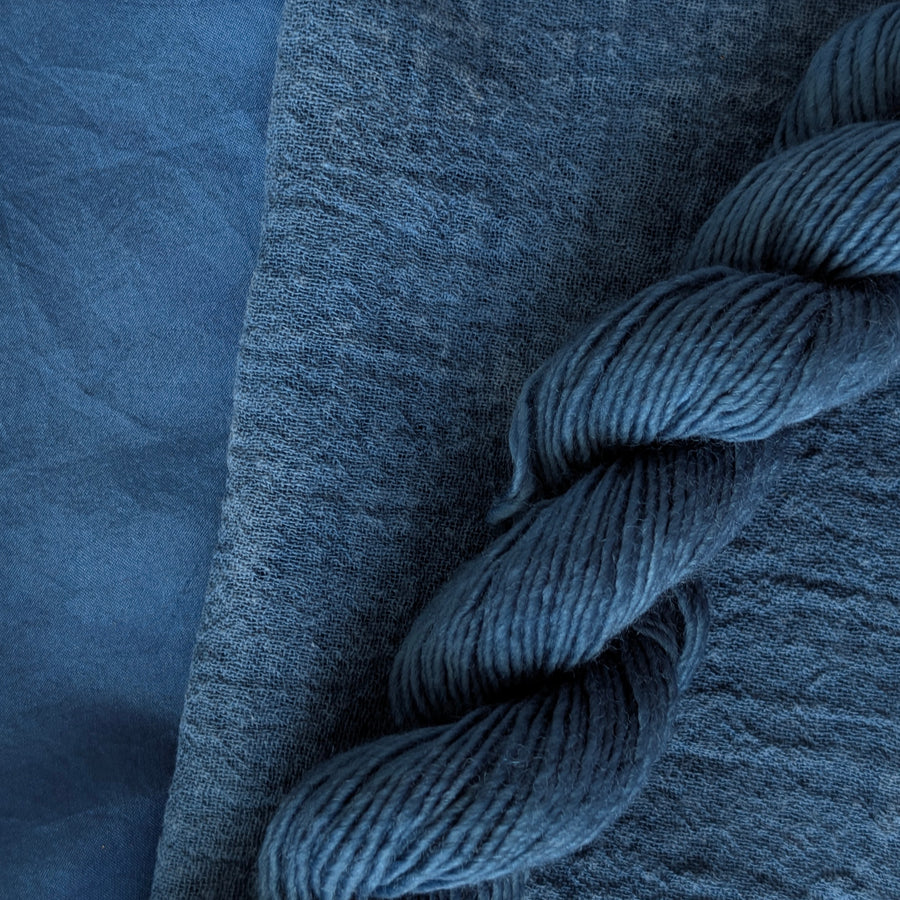 Indigo Extract - Indigofera tinctoria Dyed examples were done at 50% OWG. We used our Silk Hankies (#SH), our Cotton Bubble Gauze (#CG2-50"), and our Single Sock HT Mini Skeins (#YARN104)
