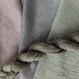 Indigo Leaves - Indigofera tinctoria Dyed examples were done at 50% OWG. We used our Silk Hankies (#SH), our Cotton Bubble Gauze (#CG2-50"), and our Single Sock HT Mini Skeins (#YARN104)