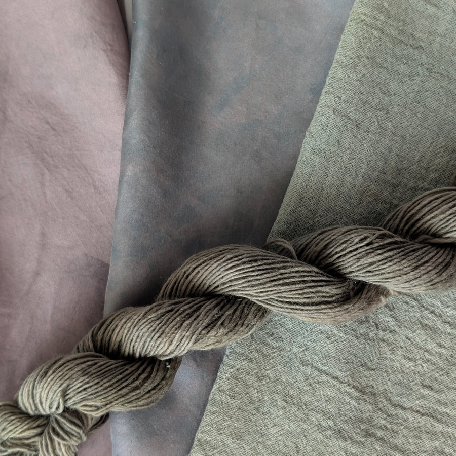Indigo Leaves - Indigofera tinctoria Dyed examples were done at 50% OWG. We used our Silk Hankies (#SH), our Cotton Bubble Gauze (#CG2-50"), and our Single Sock HT Mini Skeins (#YARN104)