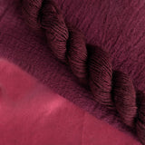 Lac  Extract - Laccifer laca/Kerria laca Dyed examples were done at 50% OWG. We used our Silk Hankies (#SH), our Cotton Bubble Gauze (#CG2-50"), and our Single Sock HT Mini Skeins (#YARN104)