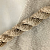 Night Jasmine - Nyctanthes arbor-tristis Dyed examples were done at 50% OWG. We used our Silk Hankies (#SH), our Cotton Bubble Gauze (#CG2-50"), and our Single Sock HT Mini Skeins (#YARN104)