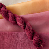 Sappanwood - Caesalpinia sappan Dyed examples were done at 50% OWG. We used our Silk Hankies (#SH), our Cotton Bubble Gauze (#CG2-50"), and our Single Sock HT Mini Skeins (#YARN104)