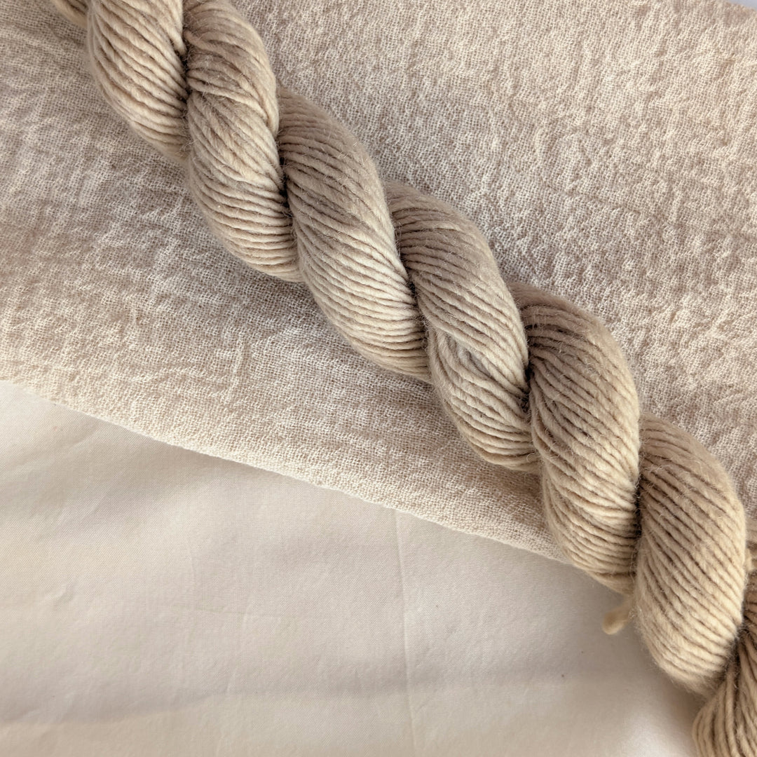 Walnut Hulls - Juglans Regia Dyed examples were done at 50% OWG. We used our Silk Hankies (#SH), our Cotton Bubble Gauze (#CG2-50"), and our Single Sock HT Mini Skeins (#YARN104)