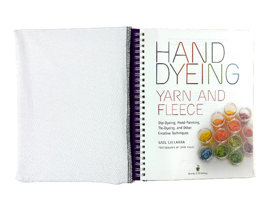 Shown on spiral bound hardcover book