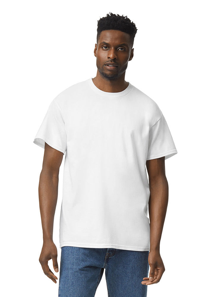Man wearing a white Gildan 5.3oz. Cotton Short Sleeve T-shirt and blue jeans on a white background.