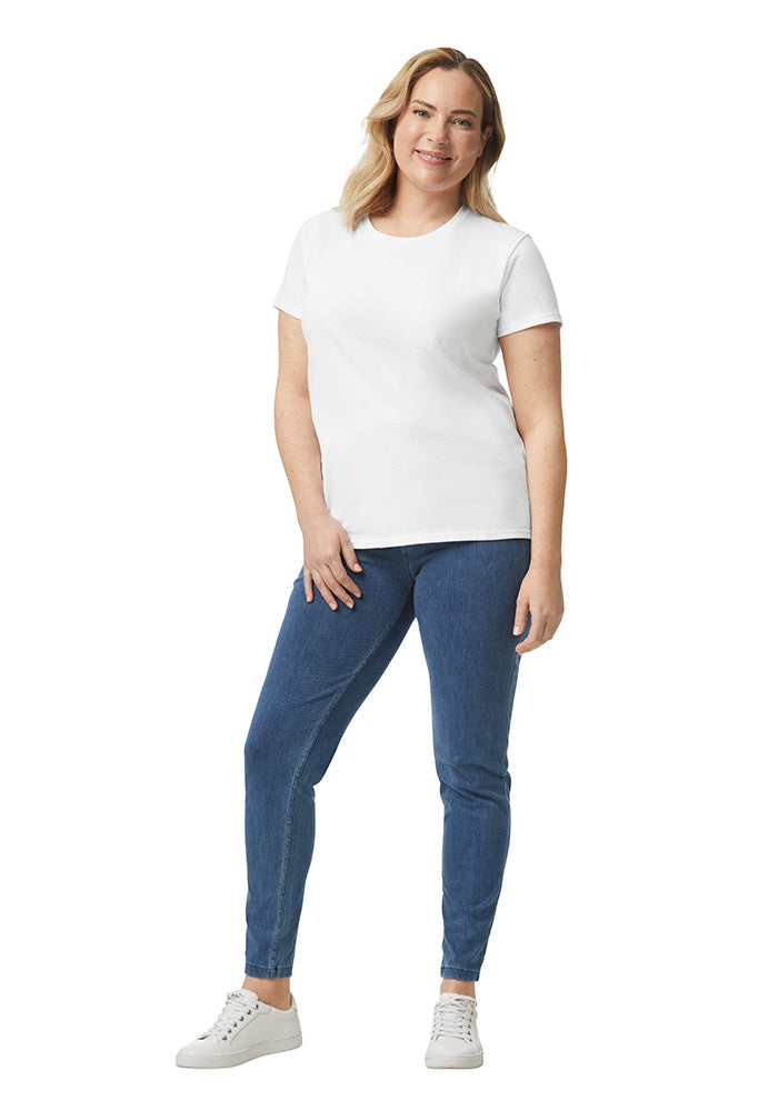 Full body view of a woman wearing a white t-shirt and blue jeans on a white background