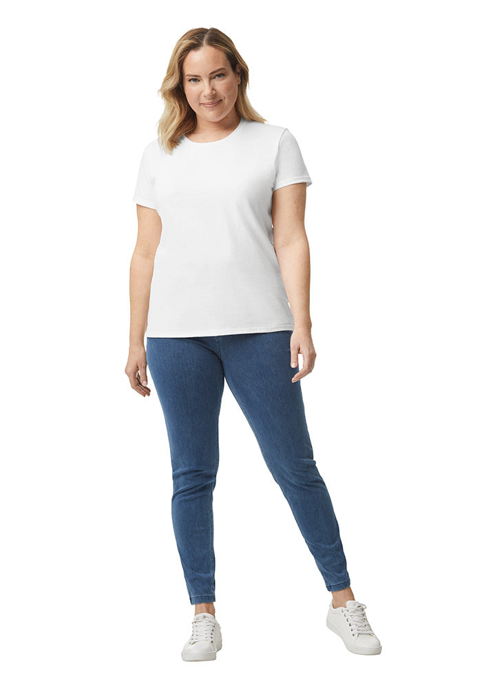 Full body view of a woman wearing a white t-shirt and blue jeans on a white background