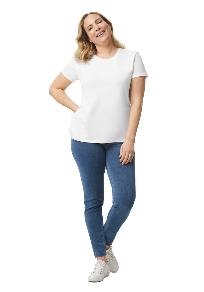 Full body view of a woman wearing a white t-shirt and blue jeans on a white background