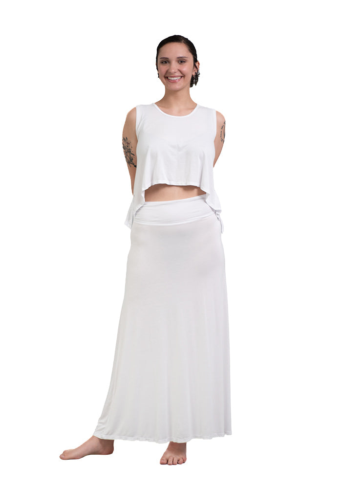 Woman wearing a white rayon/spandex jersey sleeveless top with a high front hem and low back hem on a white background.