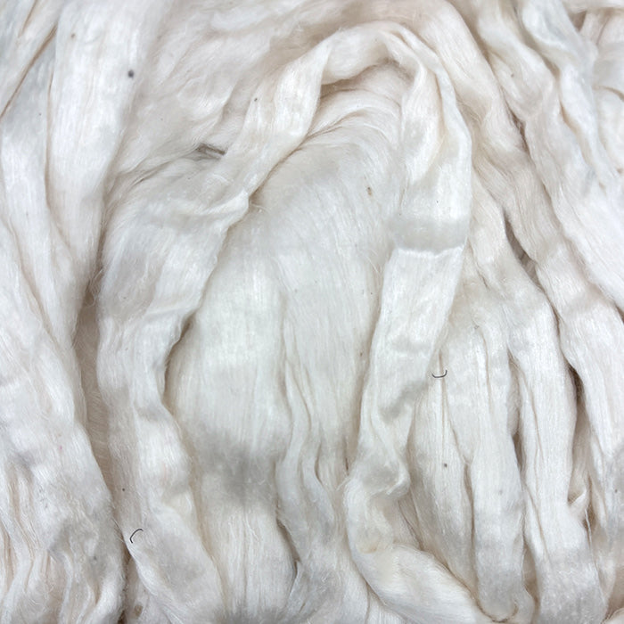 Close-up of white roving coils.